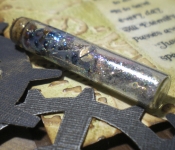 time-in-a-bottle-card-glass-vial-close-up