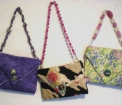 folded-bags-with-beaded-handles-all-three