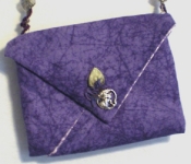 folded-bags-with-beaded-handles-purple-bag