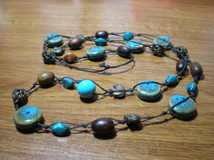 knotted blue ceramic bead necklace