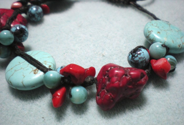 knotty beaded bracelet with turquoise rounds and red nuggets
