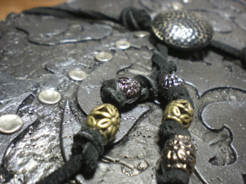 faux leather sketchbook beads close up