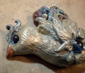 clay-fantasy-bird-swirls-head