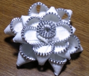 white and silver zipper flower