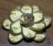 yellow and gold zipper flower