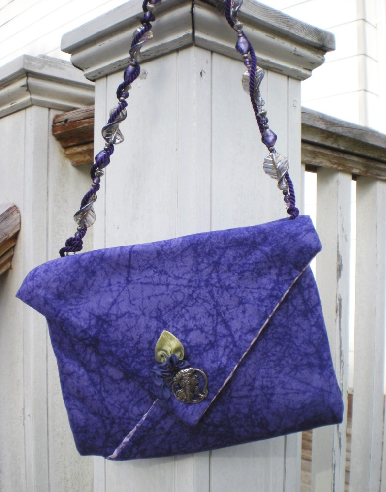 folded-bags-with-beaded-handles-purple-bag_0