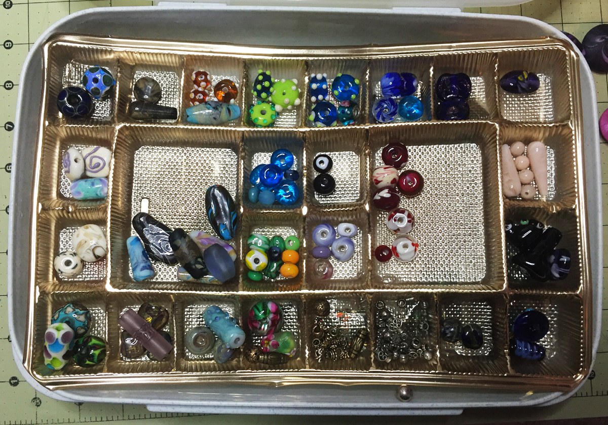 beads in chocolate trays