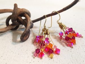 Crystal dangle earrings in gold, pink and orange 