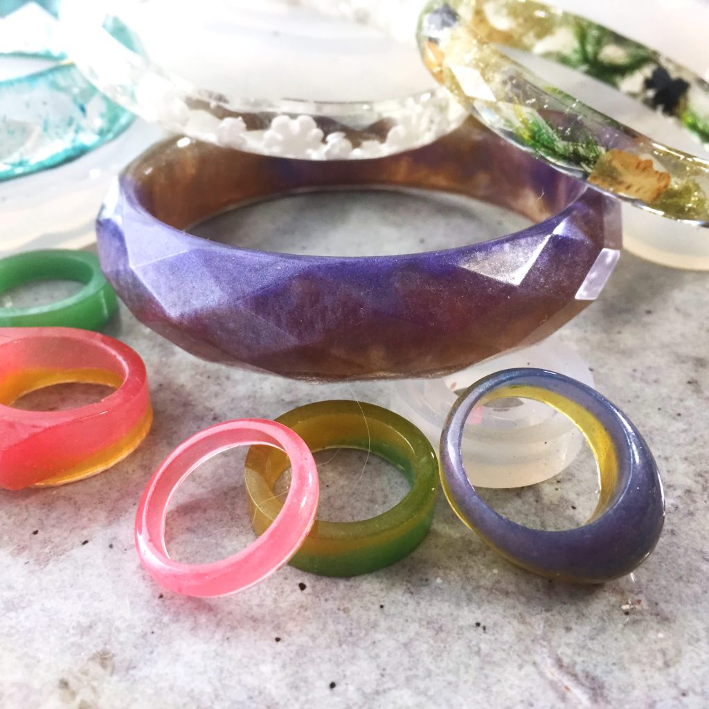 resin jewelry with colorants, sprinkles and various other inclusions