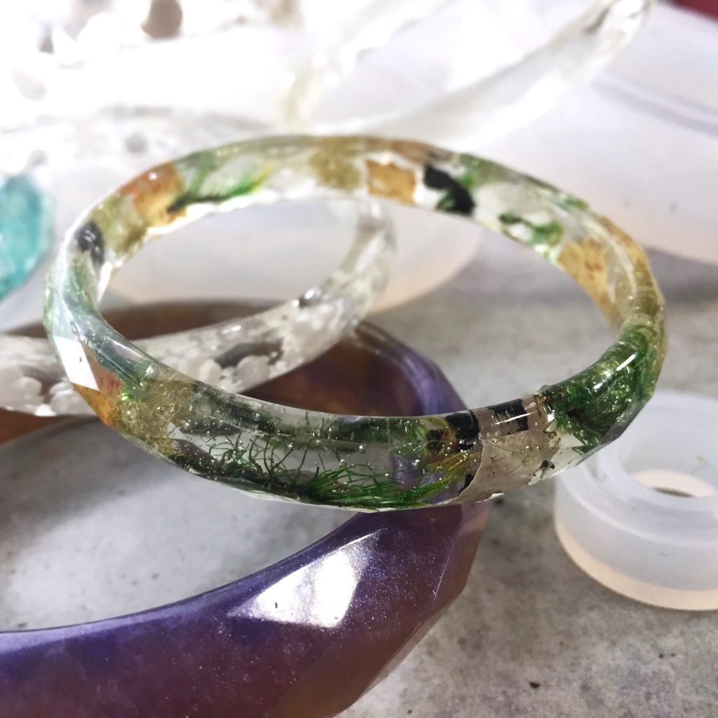 resin bangle bracelet with moss and tree bark inclusions