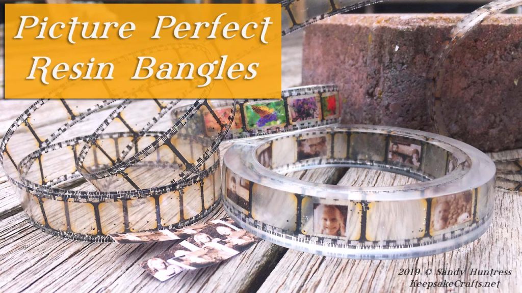 Resin bangle bracelets with film strip ribbon and photos embedded.